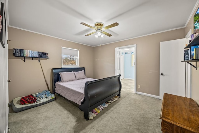 bedroom featuring carpet floors, ornamental molding, baseboards, and ceiling fan