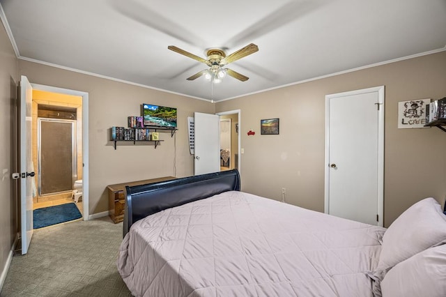 carpeted bedroom featuring ensuite bathroom, ornamental molding, a ceiling fan, and baseboards