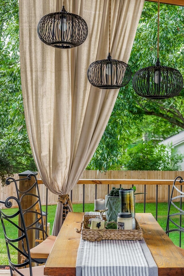 view of patio / terrace featuring fence