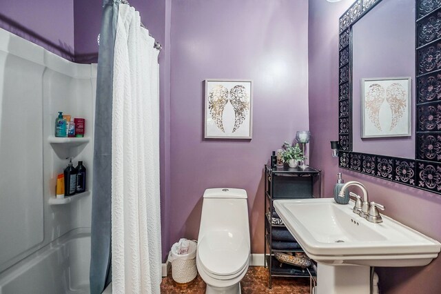 bathroom with a sink and toilet