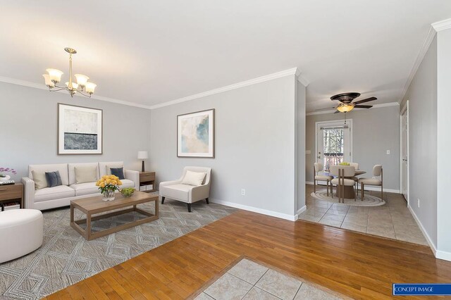 living room with baseboards, light tile patterned flooring, and crown molding