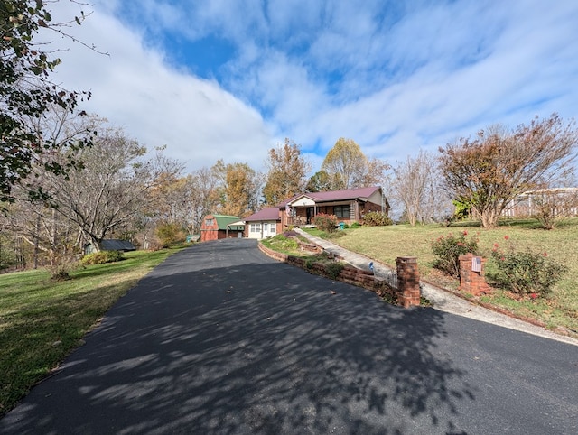 view of street with driveway