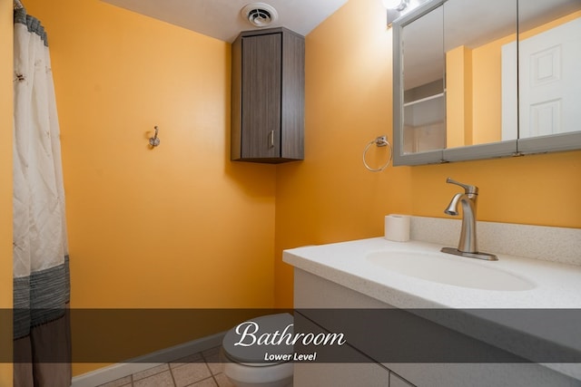 bathroom with visible vents, baseboards, toilet, tile patterned flooring, and vanity