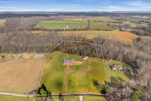 birds eye view of property featuring a rural view