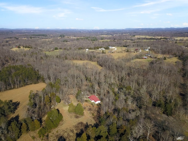 aerial view featuring a view of trees