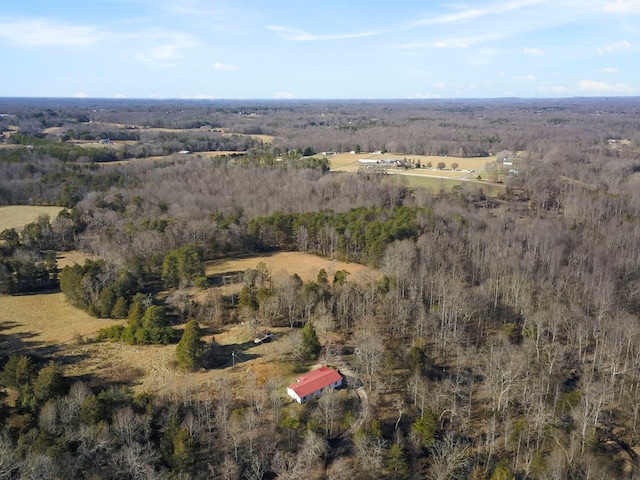 aerial view with a rural view and a view of trees