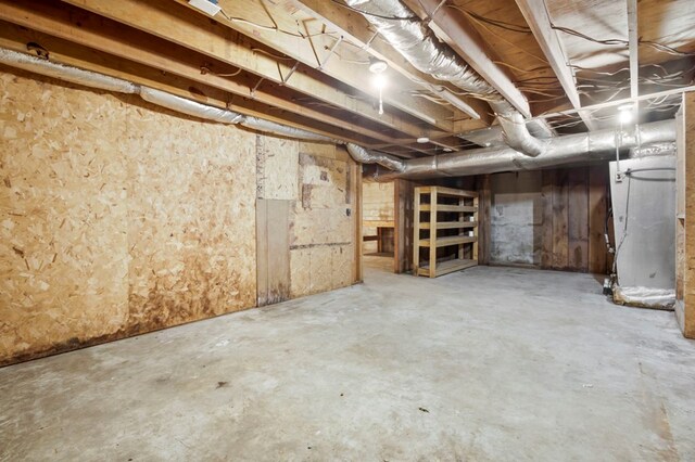 unfinished basement with heating unit