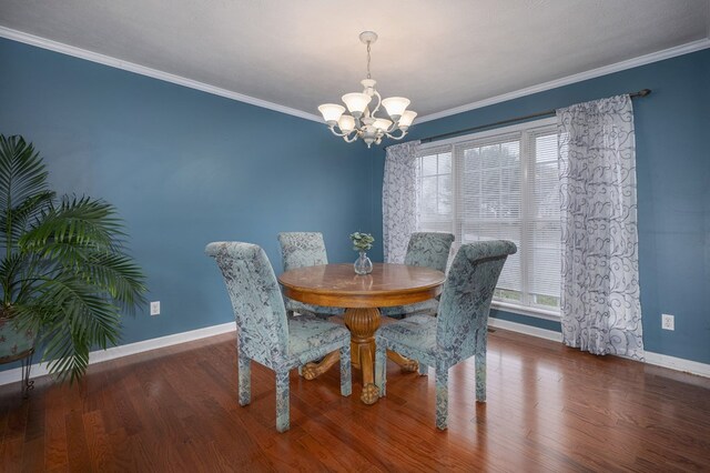 dining space with plenty of natural light, baseboards, dark wood finished floors, and crown molding