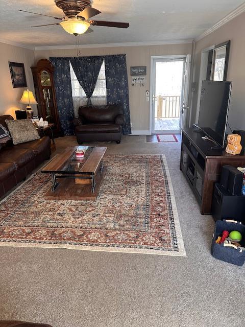 living room with light carpet and ceiling fan