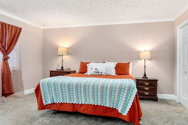 bedroom with carpet, crown molding, ceiling fan, and multiple closets