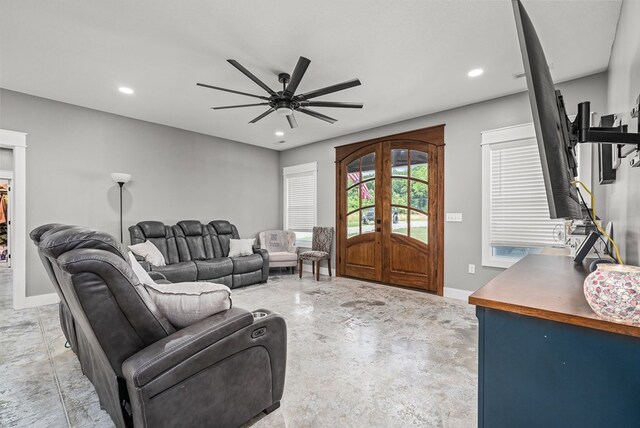 living area featuring recessed lighting, french doors, ceiling fan, and baseboards