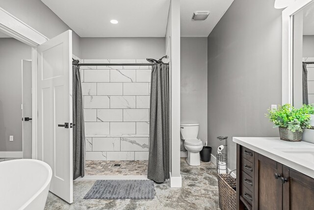 full bath featuring visible vents, a freestanding bath, toilet, a shower stall, and vanity