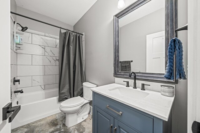 bathroom with toilet, shower / bathtub combination with curtain, and vanity