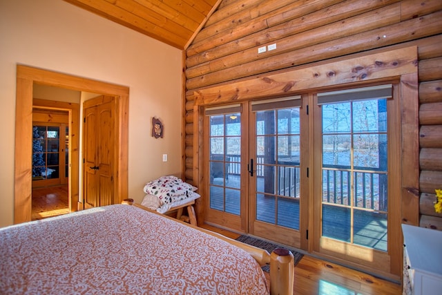 unfurnished bedroom featuring rustic walls, wooden ceiling, hardwood / wood-style floors, access to outside, and high vaulted ceiling