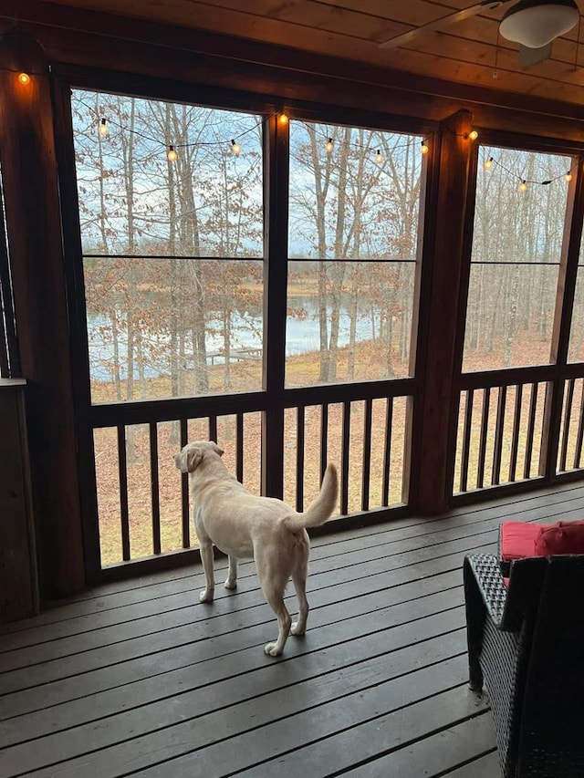 sunroom / solarium with wood ceiling