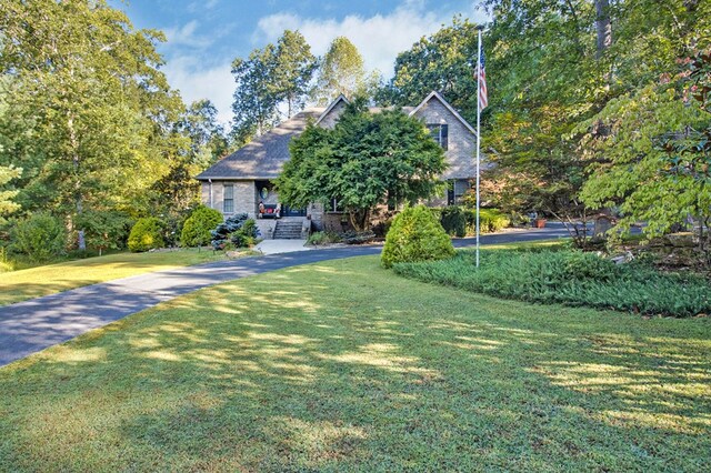 view of front of house with a front lawn