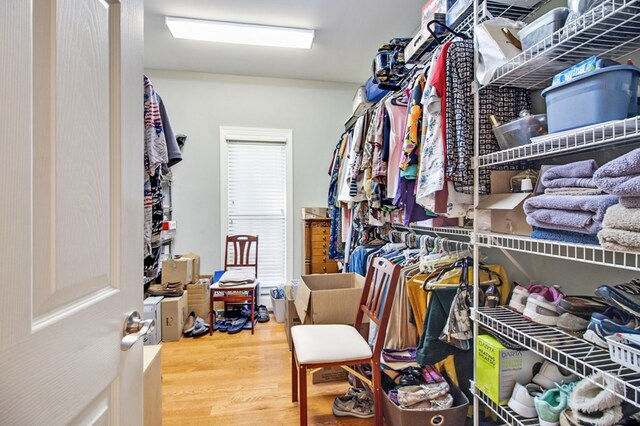 spacious closet with wood finished floors