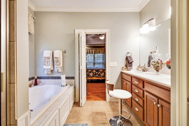 ensuite bathroom with double vanity, ensuite bathroom, ornamental molding, a sink, and tile patterned flooring