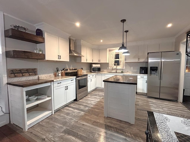 kitchen featuring open shelves, tasteful backsplash, appliances with stainless steel finishes, white cabinetry, and wall chimney range hood