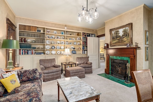 living area featuring light carpet, ornamental molding, a tile fireplace, and an inviting chandelier