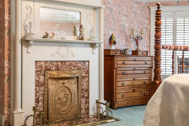 interior space featuring carpet floors and wallpapered walls