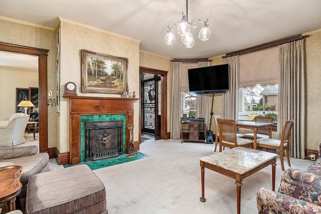 carpeted living area with an inviting chandelier, a fireplace with flush hearth, and crown molding