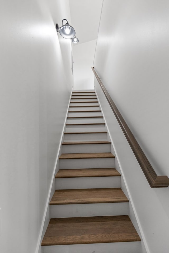 stairway with baseboards