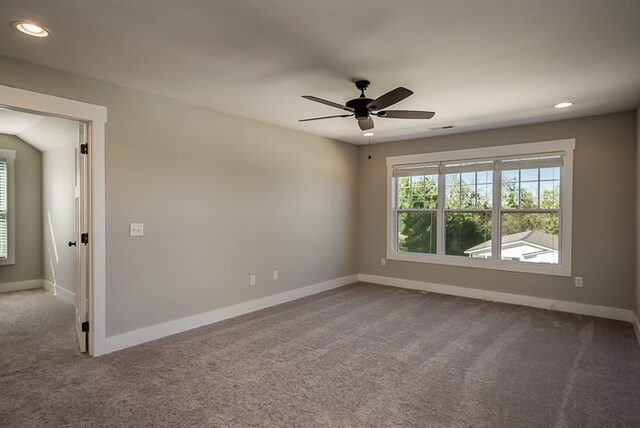 empty room with baseboards, carpet, and recessed lighting