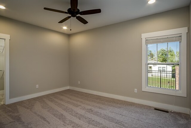 empty room with carpet, recessed lighting, visible vents, a ceiling fan, and baseboards