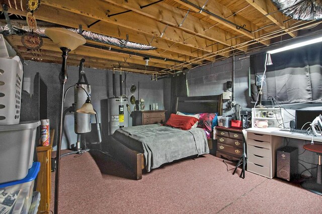 carpeted bedroom featuring electric water heater