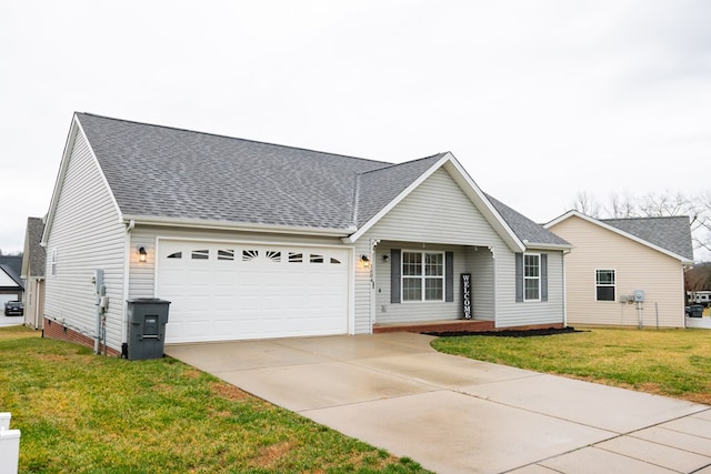 ranch-style house featuring a shingled roof, concrete driveway, an attached garage, and a front lawn