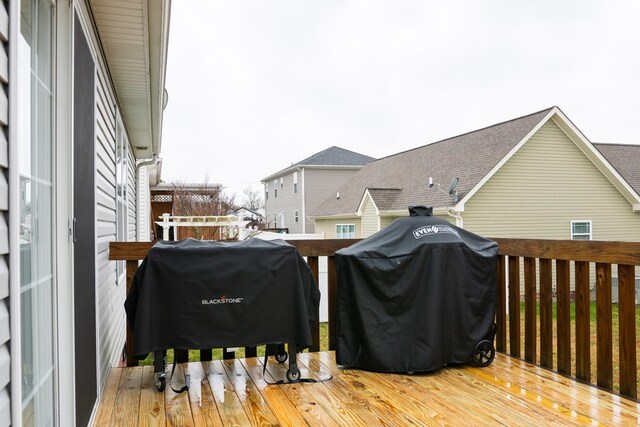 wooden deck featuring grilling area