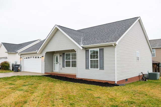 view of front facade featuring a garage, driveway, central AC, and a front yard