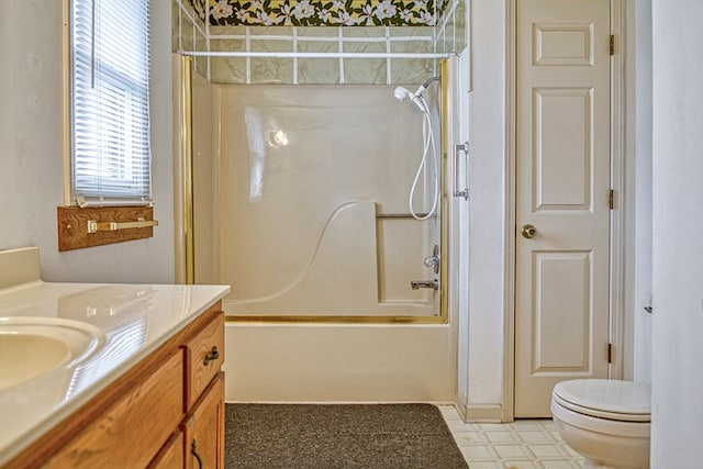 full bathroom with tub / shower combination, vanity, toilet, and tile patterned floors