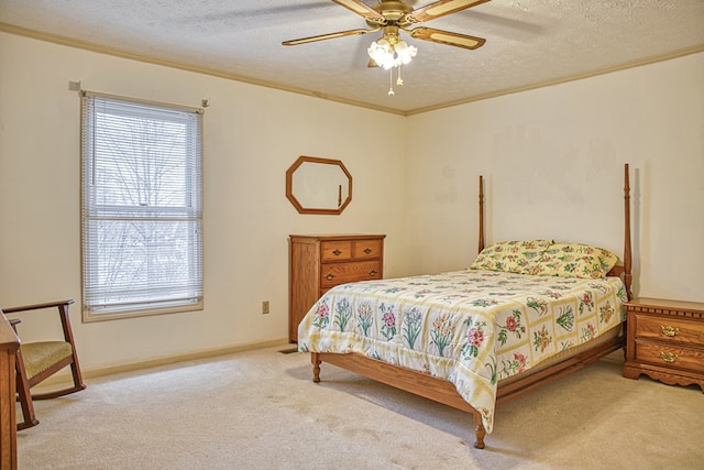 bedroom featuring carpet floors, crown molding, a textured ceiling, and baseboards