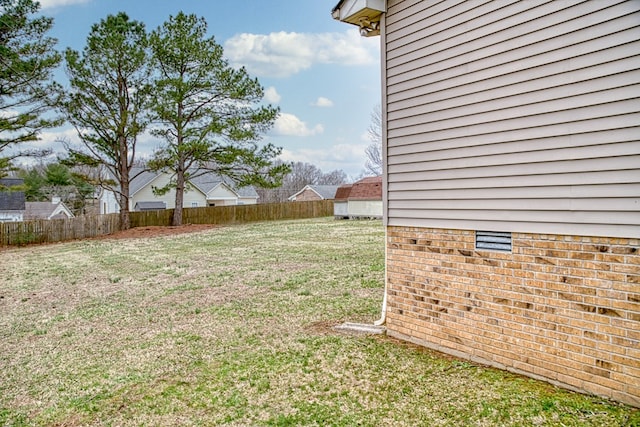 view of yard featuring fence