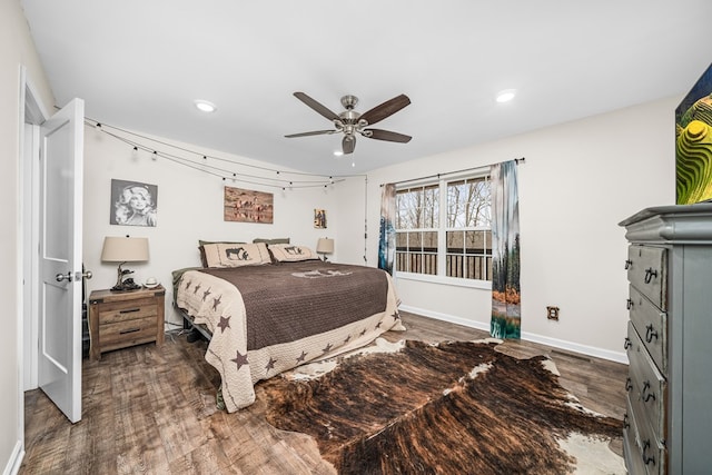 bedroom with dark wood-type flooring, recessed lighting, a ceiling fan, and baseboards