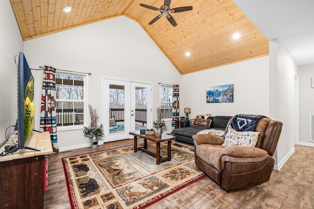 living area with high vaulted ceiling, french doors, wooden ceiling, and wood finished floors