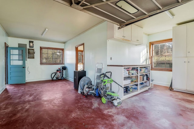 interior space featuring baseboards