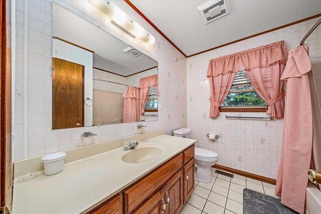 full bath featuring toilet, visible vents, crown molding, and tile patterned floors