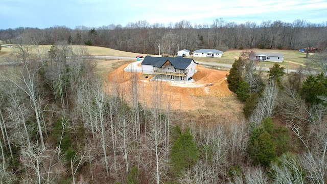 aerial view with a rural view and a forest view