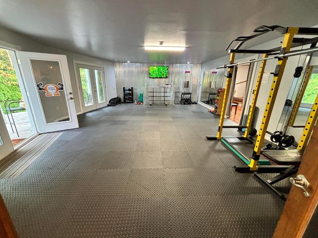 gym featuring french doors