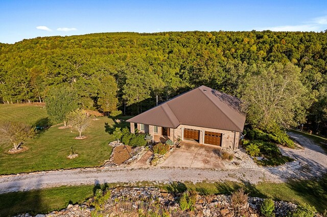 bird's eye view with a forest view