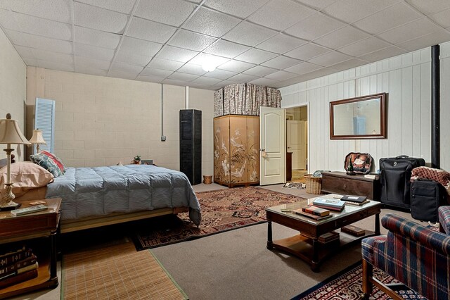 bedroom with a paneled ceiling