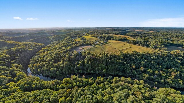 aerial view with a wooded view