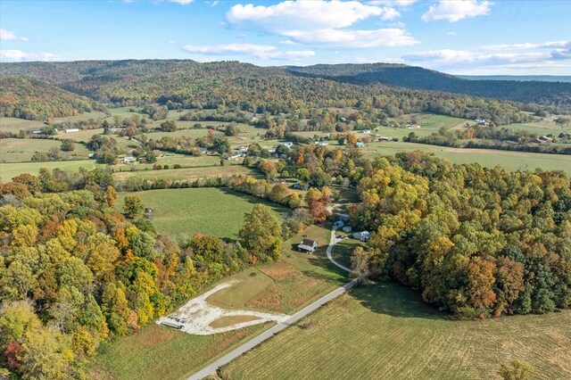 birds eye view of property featuring a rural view and a mountain view