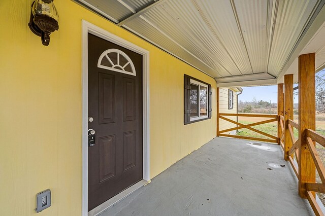 property entrance with a porch