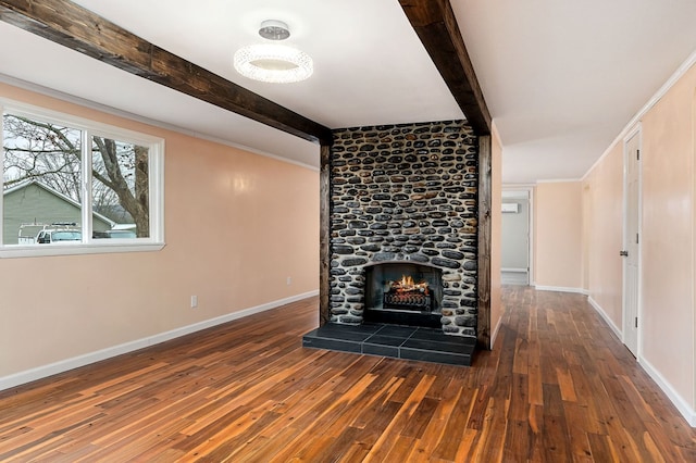 unfurnished living room featuring a fireplace, baseboards, dark wood-type flooring, and beamed ceiling