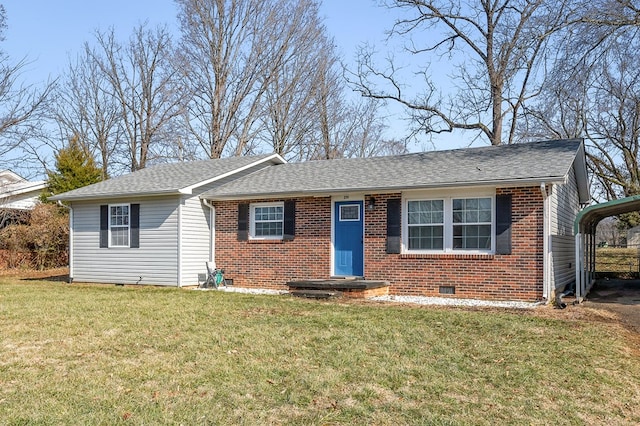 ranch-style home featuring brick siding, a detached carport, roof with shingles, crawl space, and a front yard