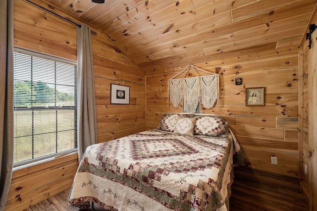 bedroom featuring wood finished floors, wooden walls, wood ceiling, and vaulted ceiling